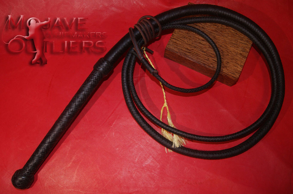 An 8ft 24 plait bullwhip in black and forest green kangaroo leather.  As you can see, the green leather darkens to all but black with leather conditioner, so it's hard to see the difference except in just the right light.